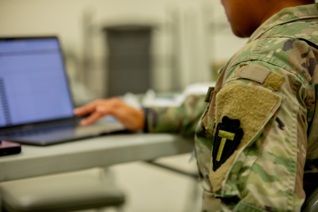 1st Lt. Karina Abella, a cyber operations officer from the 72nd Brigade Combat Team with the Texas Army National Guard, monitors the systems through her computer during exercise Cyber Shield 2025 in Virginia Beach, Virginia, June 9, 2025. Cyber...