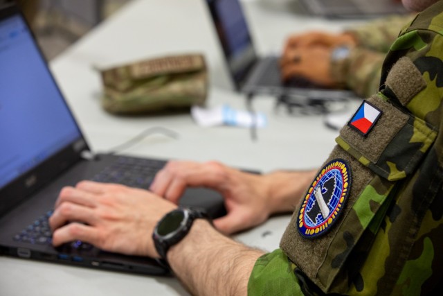 A Czech Republic military member works on a computer during exercise Cyber Shield 2025 in Virginia Beach, Virginia, June 9, 2025. Since 1993, the Czech Republic has been a state partner of Texas and Nebraska through the National Guard State...