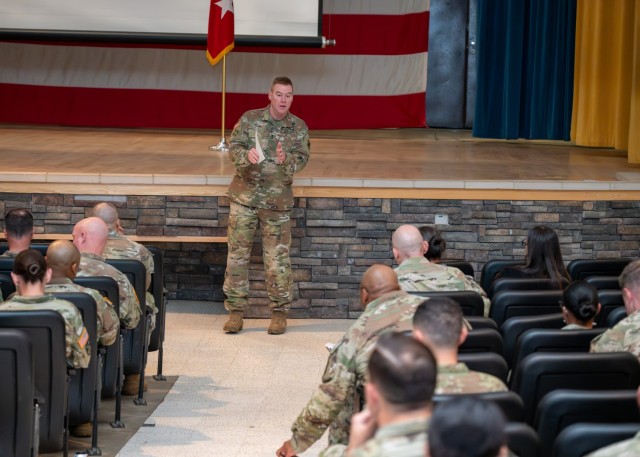 Maj. Gen. Christopher Beck, Maneuver Support Center of Excellence and Fort Leonard Wood commanding general, updates attendees about happening on post during a MSCoE town hall style meeting June 11 at Baker Theater.