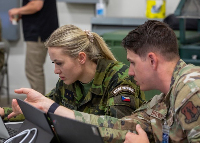 An Air National Guardsman and a Czech Republic military member collaborate during exercise Cyber Shield 2025 in Virginia Beach, Virginia, June 9, 2025. Since 1993, the Czech Republic has been a state partner of Texas and Nebraska through the...
