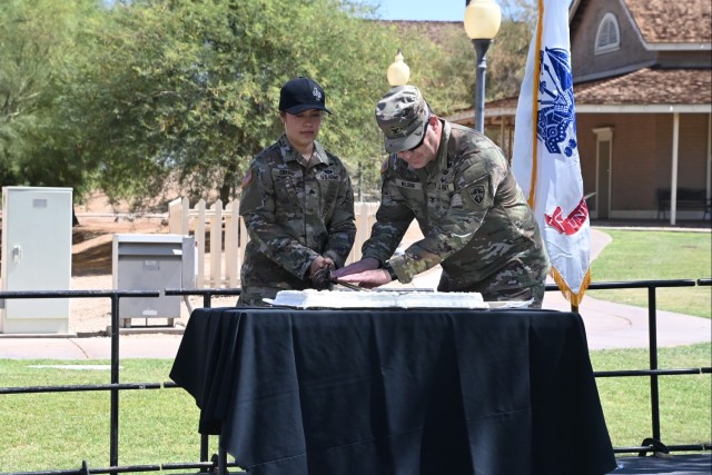 U.S. Army Yuma Proving Ground&#39;s youngest and oldest Soldiers present cut the 250th Army Birthday cake at a public celebration at Colorado River State Historic Park on June 14, 2025.