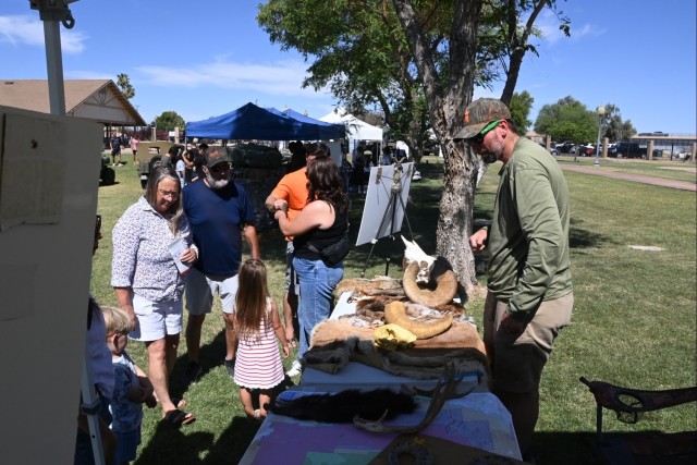 U.S. Army Yuma Proving Ground Wildlife Biologist Daniel Steward (right) interacts with crowds at the 250th Army Birthday celebration at Colorado River State Historic Park on June 14, 2025.