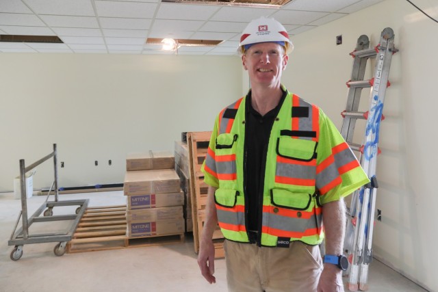 Todd Hill, Engineering & Services Division Chief, Directorate of Public Works, conducts a periodic site visit of the Rotational Stryker Brigade Headquarters building one-month before its official re-opening, May 14, 2025. The building received a...