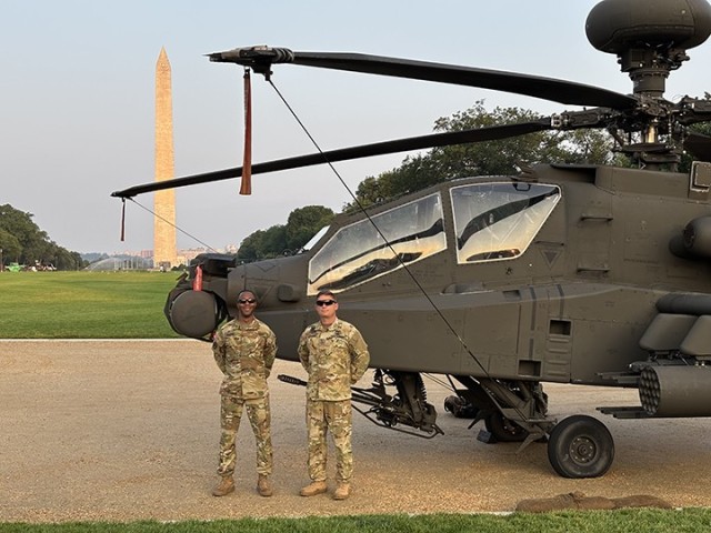 Crew members from the 1-130th Attack Battalion, North Carolina Army National Guard, support a static display during the U.S. Army's 250th birthday celebration on the National Mall in Washington, D.C., Saturday, June 14, 2025. The event honors 250...