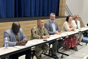 Brussels, Belgium – Jeff Gliedman, U.S. Army Garrison (USAG) Benelux in Brussels Interim Deputy Garrison manager, along with representatives from Family...