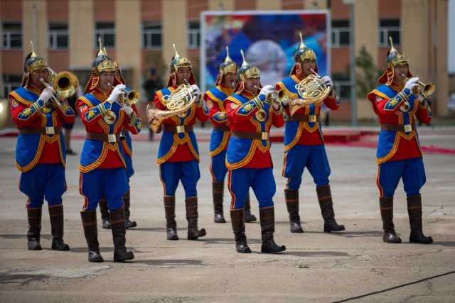 Armed Forces of Mongolia service members assigned to the Military Band of the General Staff play music during the opening ceremony of Khaan Quest 2025 on June 14, 2025, at Five Hills Training Area, Mongolia. Khaan Quest is an annual, multinational...