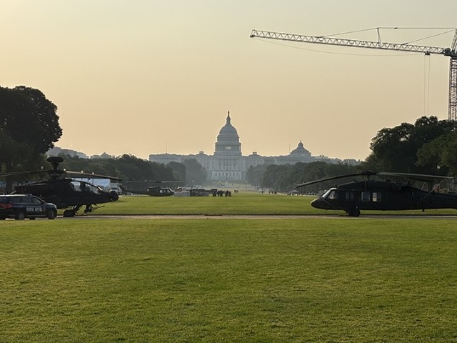 Crew members from the 1-130th Attack Battalion, North Carolina Army National Guard, support a static display during the U.S. Army's 250th birthday celebration on the National Mall in Washington, D.C., Saturday, June 14, 2025. The event honors 250...