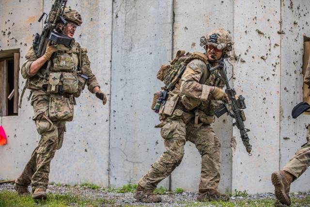 U.S. Army Paratroopers from 2nd Brigade Combat Team (2BCT), 82nd Airborne Division, conduct their final assessment on live-fire week, which includes the firing of live rounds and explosives while moving as a unit during Joint Readiness Training...