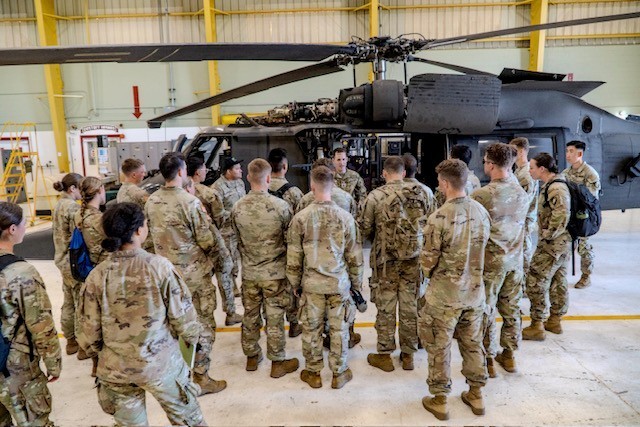 USMA Cadets speak with U.S. Army Warrant Officers on May 28, 2025 at Wheeler Army Airfield.