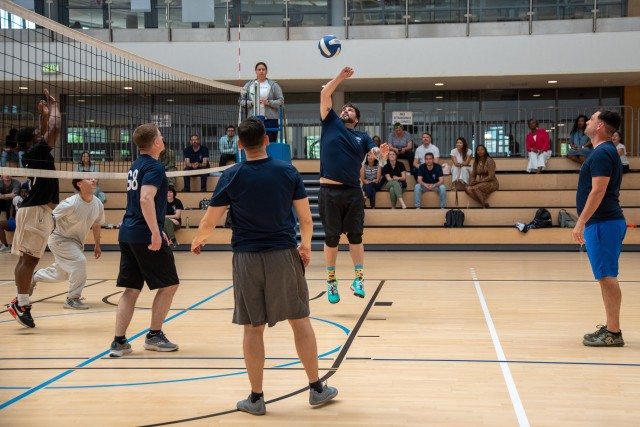 U.S. Army Soldiers face off during a volleyball game held as part of the U.S. Army Garrison Wiesbaden’s Commander’s Cup Sports Tournament on Lucius D. Clay Kaserne, Wiesbaden, Germany June 12, 2025. 
...