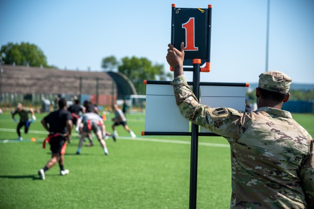 A U.S. Army Soldier with 2nd Multi-Domain Task Force holds a down indicator during a flag football game held as part of the U.S. Army Garrison Wiesbaden’s Commander’s Cup Sports Tournament on Lucius D. Clay Kaserne, Wiesbaden, Germany June 12,...