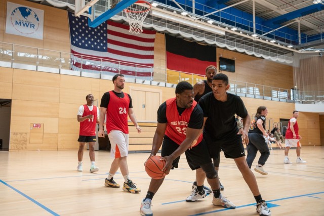 U.S. Army Soldiers face off during a basketball game held as part of the U.S. Army Garrison Wiesbaden’s Commander’s Cup Sports Tournament on Lucius D. Clay Kaserne, Wiesbaden, Germany June 12, 2025. 
...