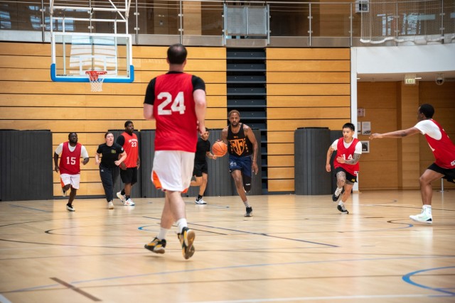 U.S. Army Soldiers face off during a basketball game held as part of the U.S. Army Garrison Wiesbaden’s Commander’s Cup Sports Tournament on Lucius D. Clay Kaserne, Wiesbaden, Germany June 12, 2025. 
...