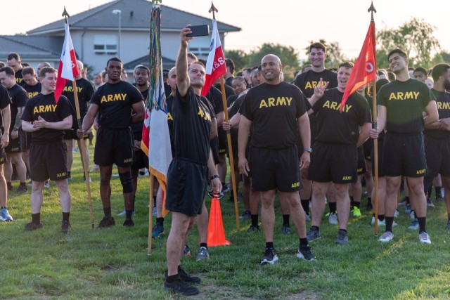 U.S. Army Soldiers with Headquarters and Headquarters Battalion, U.S. Army Europe and Africa, pose for a photo while standing at rest in formation ahead of a post run held in honor of the U.S. Army’s 250th anniversary, organized by U.S. Army...