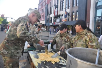 Soldiers volunteer during Western Heritage Street Breakfast
