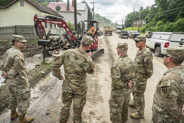 West Virginia National Guard Adjutant General Maj. Gen. Jim Seward visits with Guard members activated on flood response duty in Ohio County, West Virginia, on June 17, 2025. West Virginia Governor Patrick Morrisey declared a state of emergency...