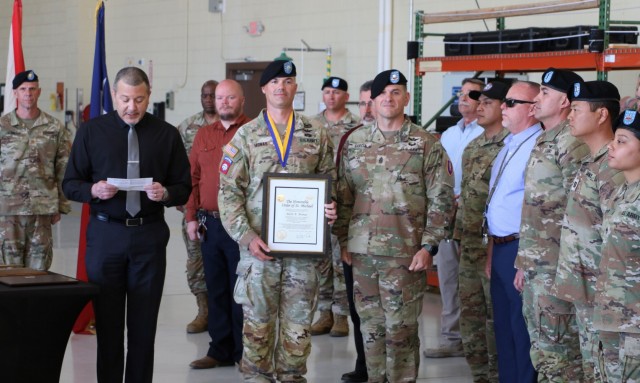 Regulators host change of command
