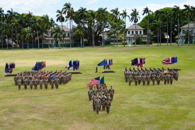 Soldiers assigned to the 3d Multi-Domain Task Force stand in formation during the unit’s change of command ceremony on historic Palm Circle at Fort Shafter, Hawaii, June 18, 2025.