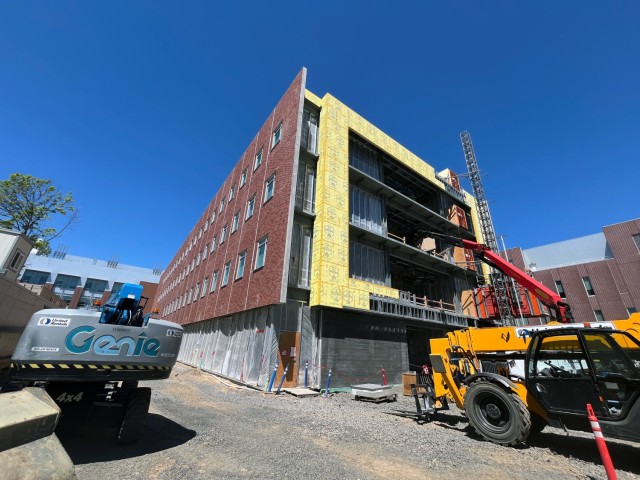 The Plant Sciences Building exterior with its siding (brick panels) nearly complete, June 11, 2025.