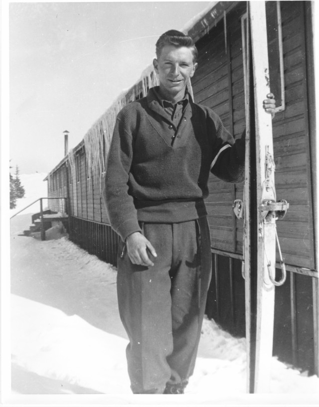 Pfc. George Morrison Jr. photographed at Cooper Hill Ski Area Civilian Conservation Corps barracks, March 11, 1943,  where he was stationed for a week to learn the Army method of skiing. Morrison tested high because of his skiing experience and he...