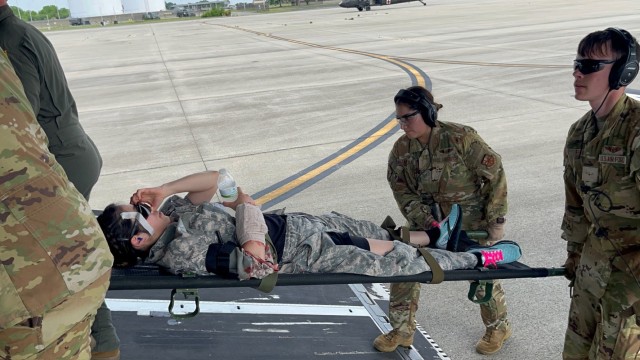 Keller Soldiers and Guardsmen Soldiers and Airmen conducted a tail-to-tail transport from a UH-60L Blackhawk to a C-17 Globemaster.