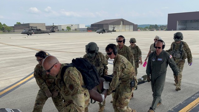 Keller Soldiers and Guardsmen Soldiers and Airmen conducted a tail-to-tail transport from a UH-60L Blackhawk to a C-17 Globemaster.