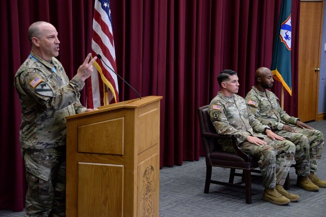 Guest speaker Midwest Joint Regional Correctional Facility Battalion (Corrections) Command Sgt. Maj. Travis Huggard talks about the process to become a Sergeant Audie Murphy Club member during the SAMC induction ceremony for Kennel Master Sgt. 1st...