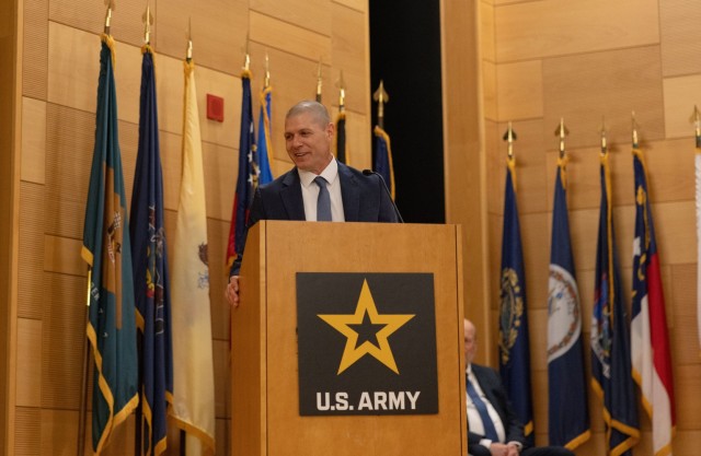 Chris Jais, incoming PM PNT project manager, provides remarks during a change of charter ceremony on Aberdeen Proving Ground.