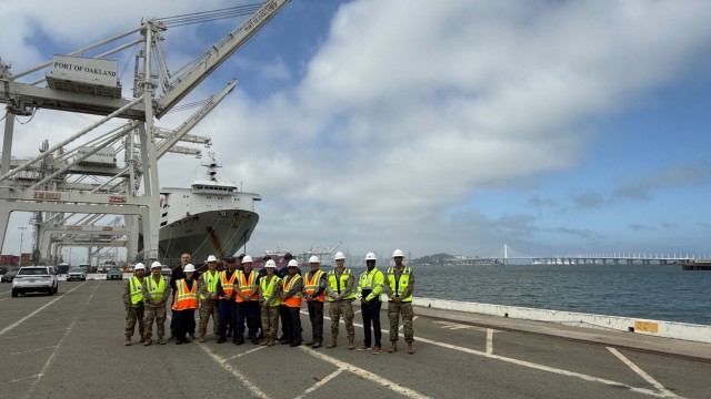 Soldiers and civilians from the 834th Transportation Battalion who facilitated the shipment of the military hardware. Also in the group are members of the Coast Guard from Sector San Francisco who monitor the waters around the Port of Oakland.