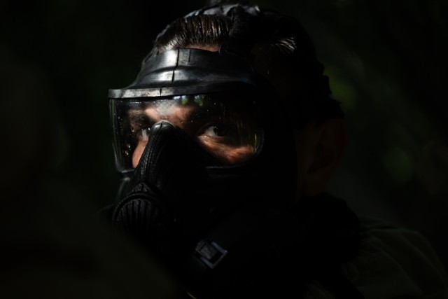 Cadet Stephen Reyes, 2nd Regiment, Advanced Camp, from Methodist University, practices sealing his mask during chemical, biological, radiological and nuclear training at Fort Knox, Ky., June 22, 2025. CBRN training helps Cadets gain trust in their...