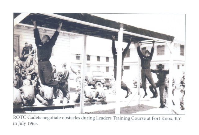 Cadets complete an obstacle course as part of the Leaders Training Course at Fort Knox, Kentucky in July 1965.
