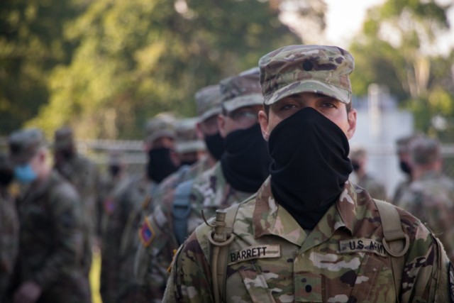 Cadet Bryce Barrett, University of Louisville, stands in formation while awaiting COVID-19 testing with Alpha Company, 1st Regiment of the 7th Brigade Operation Agile Leader Field Training Exercise. The exercise was held at Fort Knox, Ky. from...