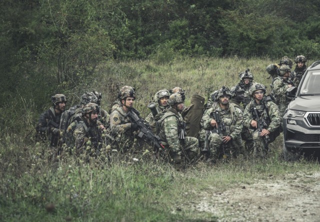 U.S. Army paratroopers assigned to the 173rd Airborne Brigade prepare to move during a final battle in Hohenfels, Germany as part of exercise Saber Junction 24, Sept. 13, 2024....