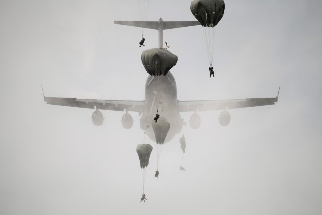 Paratroopers from 2nd Brigade, 11th Airborne Division conduct airborne operations from a C-17 Globemaster III onto Malemute Drop Zone on Joint Base Elmendorf-Richardson, AK, on August 24, 2022. (Photo by SrA Patrick Sullivan, U.S. Air Force)