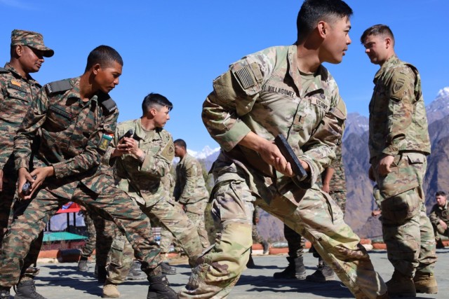 Lt. Villagomez, 1st Battalion, 40th Cavalry Regiment, 2nd Brigade, 11th Airborne Division, participates in weapon retention drills and combatives with other soldiers from the 9th Assam Regiment, Indian Army, and 1-40th Cav during exercise Yudh...