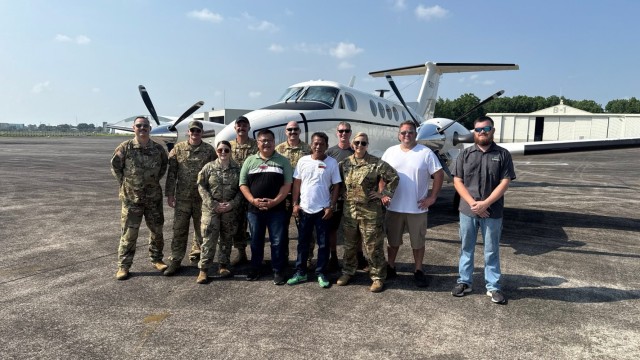 Chief Warrant Officer Circles the Globe in C-12 Huron
