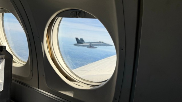 Chief Warrant Officer Circles the Globe in C-12 Huron