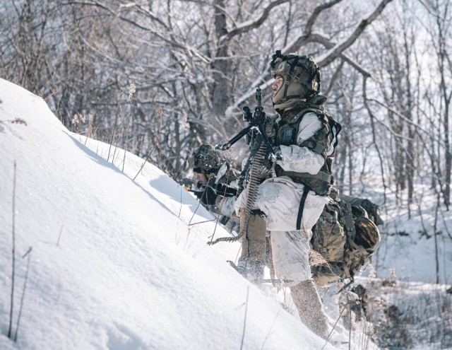 U.S. Army Spc. Richard Diaz, an infantryman from 3rd Platoon, Alpha Company, 1st Battalion, 5th Infantry Regiment, moves to provide security during North Wind 25 in Minami-eniwa, Japan, February 8, 2025. North Wind 25 is a bilateral cold-weather...