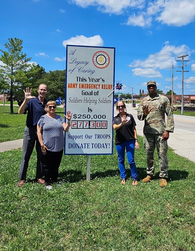 From left, Chuck Matthews, Army Community Services Financial Readiness program manager and Army Emergency Relief officer; Kristina Stump, Army Community Services AER specialist; Megan Moran, Army Community Services AER specialist; and Capt....