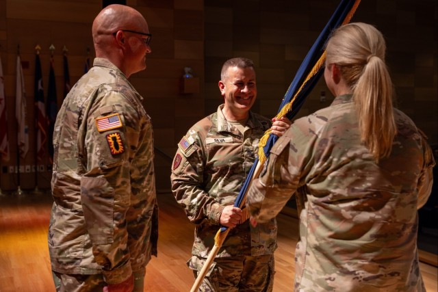 Brig. Gen. W Bochat (right), Command Sgt. Maj. David J. Silva (center) and Sgt. Maj. Dustin R. Rolfe (left)