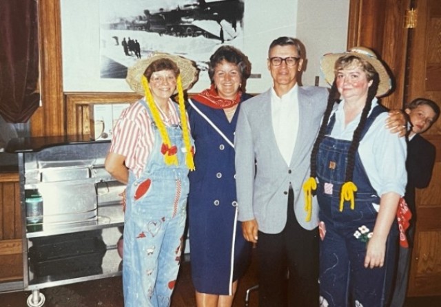 Mary Pavey, far right, poses with former colleagues during a themed office celebration at Fort Leavenworth. Pavey retired July 1, 2025, after 56 years of federal service.