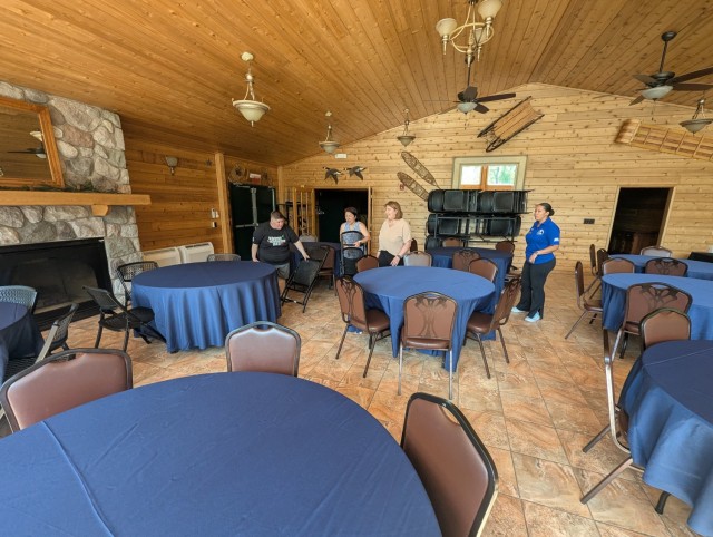Fort Drum FMWR staff set up Oates Overview Lodge in Remington Park for a community luncheon during Mountainfest week. (Photo by Mike Strasser, Fort Drum Garrison Public Affairs)