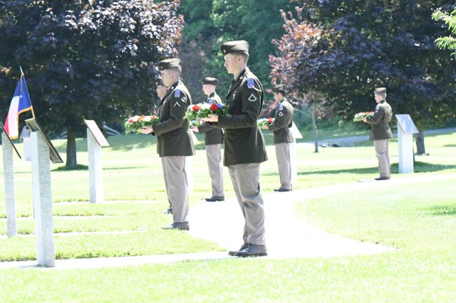 Dozens of 10th Mountain Division (LI) Soldiers set up and rehearse the Annual Remembrance Ceremony in Memorial Park, which includes a color guard, wreath-laying, and a three-volley salute firing party. The ceremony honors the service and...