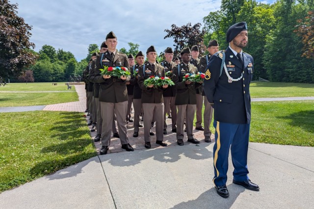Dozens of 10th Mountain Division (LI) Soldiers set up and rehearse the Annual Remembrance Ceremony in Memorial Park, which includes a color guard, wreath-laying, and a three-volley salute firing party. The ceremony honors the service and...