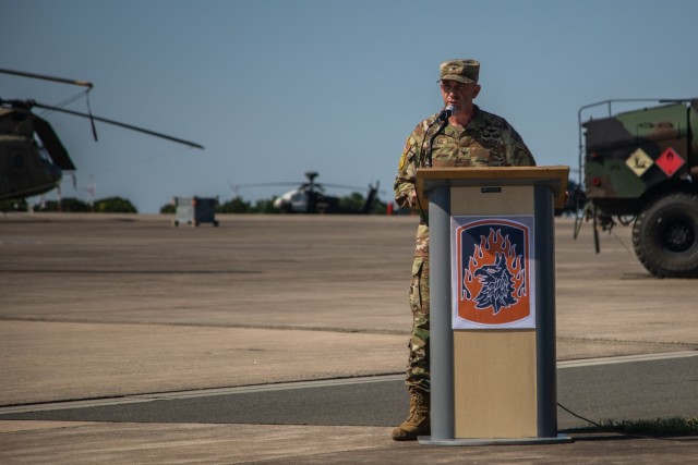 U.S. Army Col. Ryan Kendall, the outgoing brigade commander of 12th Combat Aviation Brigade, gives a departing speech during the change of command on Katterbach Army Airfield, Ansbach, Germany, July 2, 2025. A change of command ceremony in the...