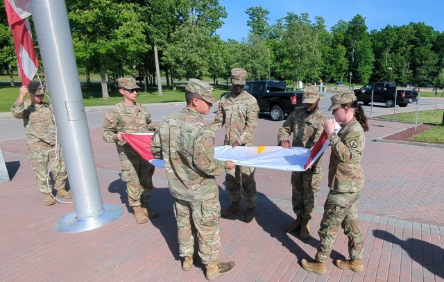Every morning at Reveille and every afternoon at Retreat, a team of 10th Mountain Division (LI) Soldiers raise and lower the American flag outside Hays Hall at Fort Drum. This week, June 23-27, a Gold Star flag accompanies the American flag to...