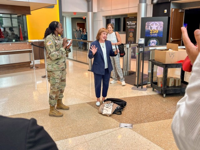 (From left) Army Materiel Command&#39;s Col. Nichole Downs, the Director of Public and Congressional Affairs, presented USASAC Director Kim Capehart with a three-star note from AMC Acting Commander Lt. Gen. Christopher Mohan at AMC Headquarters on...