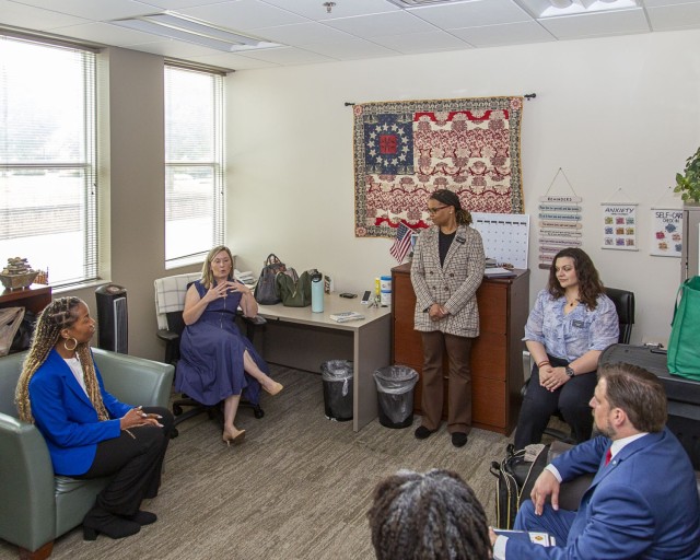 Mr. Stephen B. Simmons, Deputy Assistant Secretary of Defense for Military Community and Family Policy (MC&FP), right, listens to Fort Belvoir Military and Family Life Couselors during his first foray to a military installation, June 9. He...