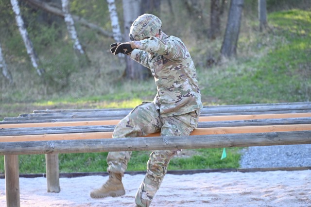 SGT Deron Satchell- representing USAG Ansbach at the 2025 Installation Management Command-Europe (IMCOM-E) Best Warrior Competition (BWC) during the obstacle course at the U.S. Army Garrison (USAG) Stuttgart's Panzer Range Complex in Boeblingen,...
