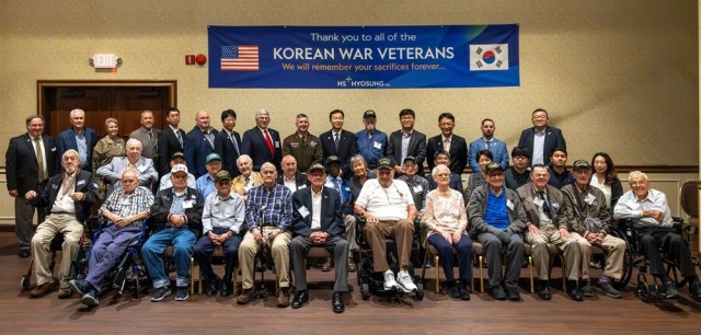 Korean War veterans gather with community leaders and others at the 19th annual Korean War Veterans Luncheon on June 25 at The Summit.